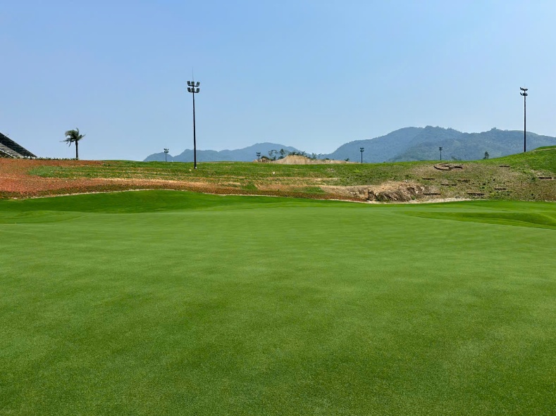 Montaña Golf Project fairway with Mach 1 Ultradwarf Bermuda greens, North Vietnam
